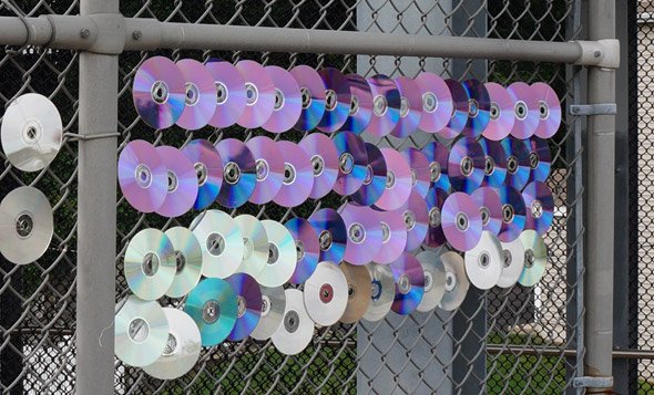 CDs on a fence at the Fairmount commuter-rail station in Hyde Park