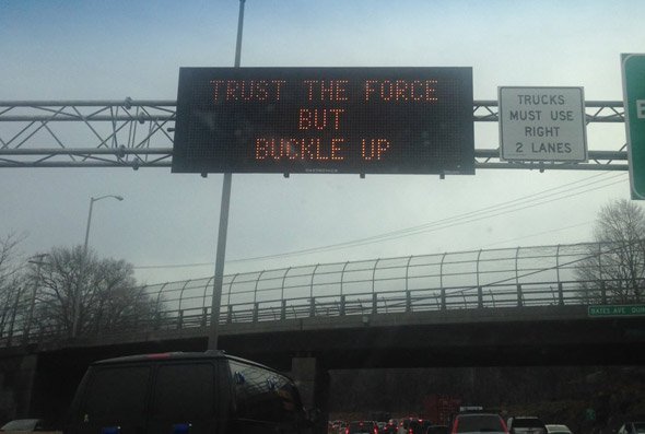 Sign urges drivers to trust the force but buckle up in Boston