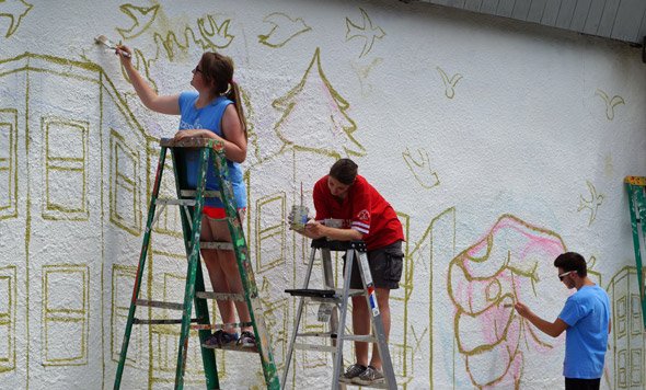 High-school students working on new mural in Roslindale