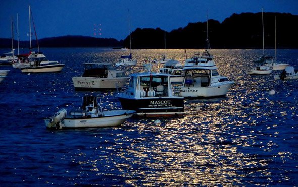 Boats off South Boston at night