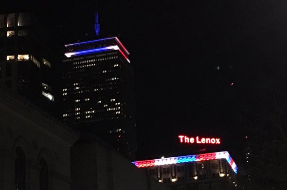 Prudential building lit in colors of French flag