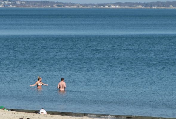 Some braved the water at Revere Beach.