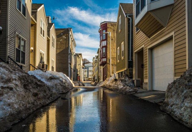 Canal-like street in Boston as snow melts