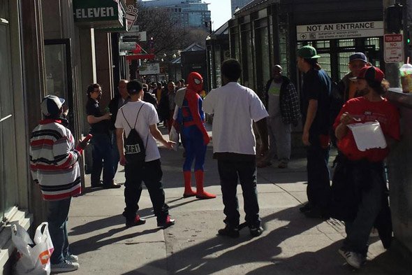 Spiderman surrounded on Tremont Street in Boston.