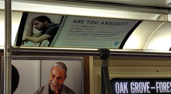 Anxious ad on the MBTA Orange Line