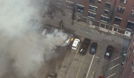 Two cars on fire on Lagrange Street in Chinatown