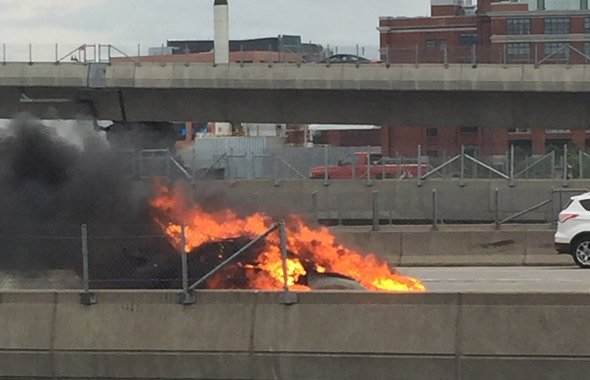 Car in flames on I-93 in Boston