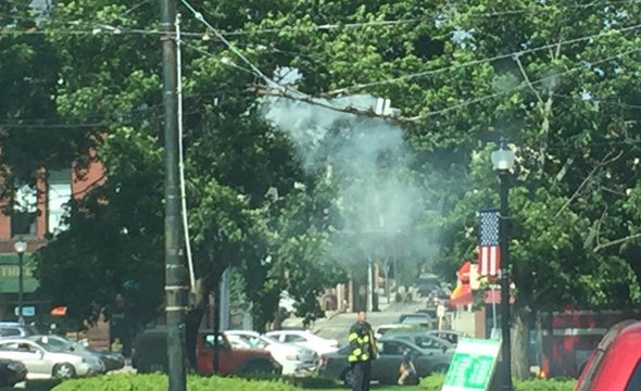 Burning trackless-trolley wires in Watertown Square