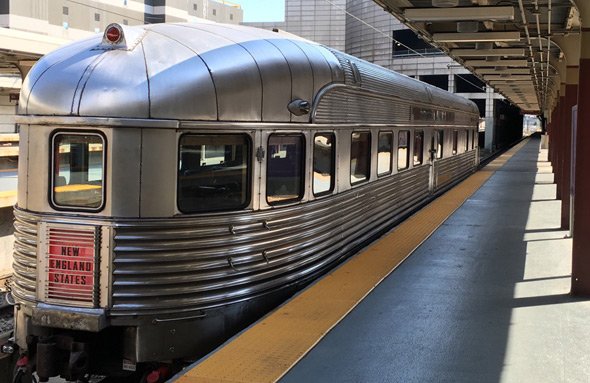 Old passenger car parked at South Station in Boston