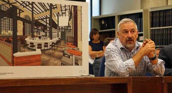 Chris Douglass with plans for proposed Roslindale restaurant
