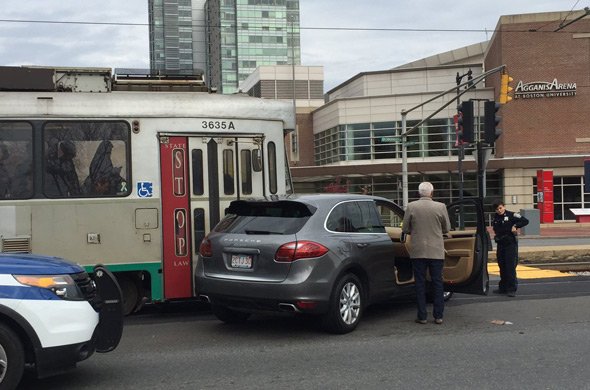 Car and trolley on Commonwealth Avenue
