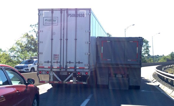 Two trucks stuck on ramp to I-495