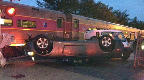 Turtle car hit by train in Needham