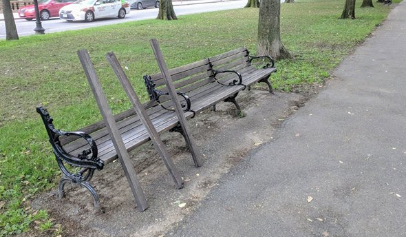 Vandalized bench on Commonwealth Avenue Mall