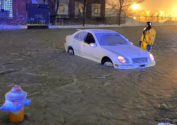 Flooded car in Chelsea