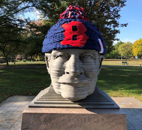 Arthur Fiedler's giant head with a Red Sox cap on