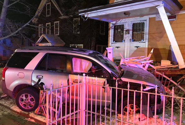 Car smashes into house in Roslindale