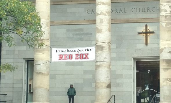 Banner on church says: Pray for the Sox