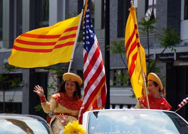 Women with South Vietnamese and American flags