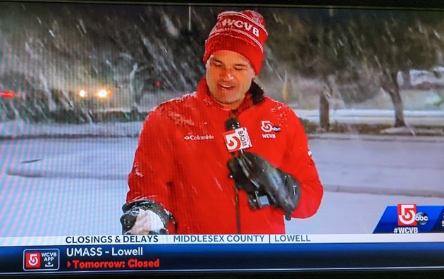 Channel 5 reporter with a snowball