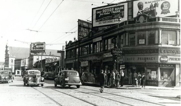 Street scene in old Boston, featuring trolley tracks and Katz Pharmacy