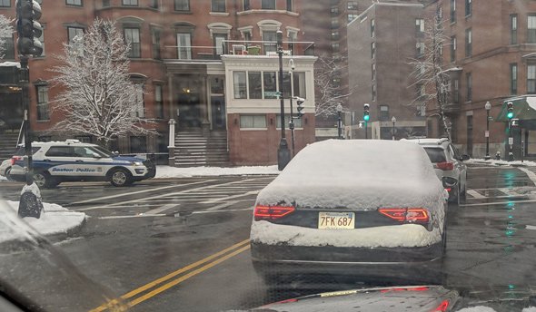 Car in the South End whose driver didn't clear the rear window of snow