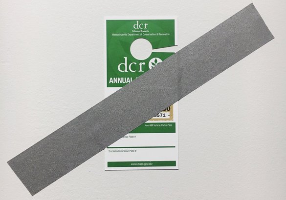 Duct-taped Massachusetts State Park admission tag