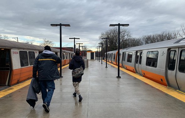 Old and new Orange Line cars at Oak Grove