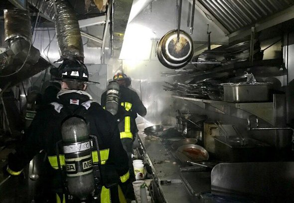 Firefighters in Trattoria il Panino kitchen