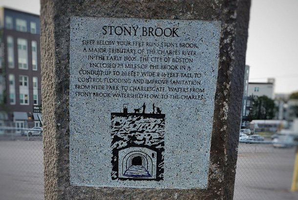 New monument to Stony Brook, creek that runs under the Arborway at Forest Hills