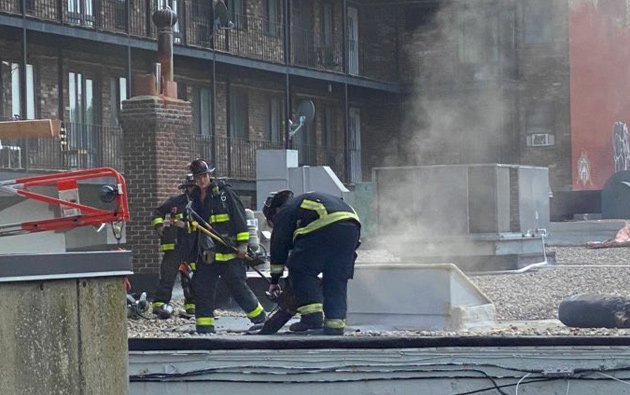 Firefighters on Commonwealth Avenue roof