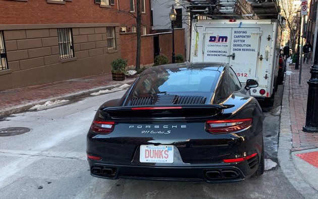 Dunks license plate on a Porsche on Beacon Hill