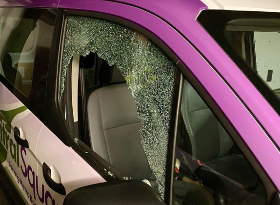 Smashed window in floral van