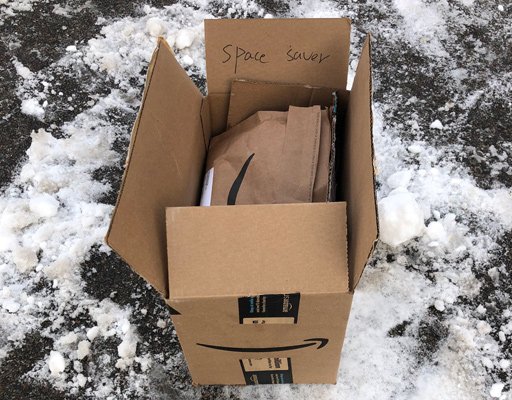 Amazon box marked as "space saver"