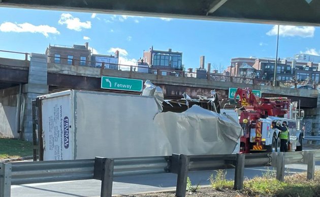 Storrowed truck on its side