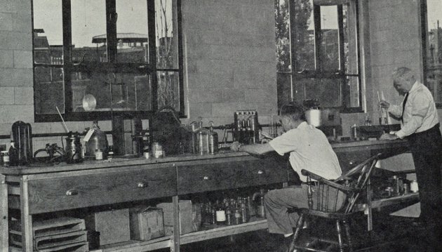 Two guys at a workbench