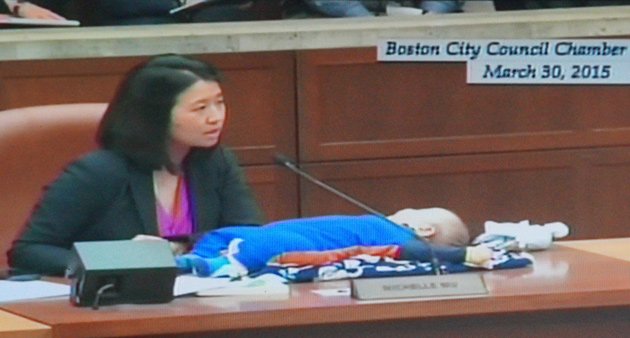 Michelle Wu and son Blaise at Boston City Council hearing on snow removal