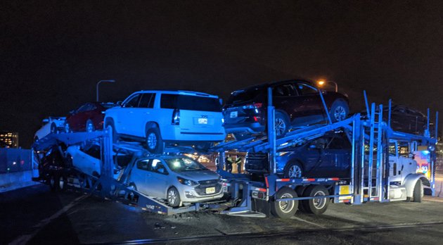 Disabled car carrier by South Station bus depot