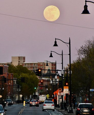 Full moon over Union Square in Somerville