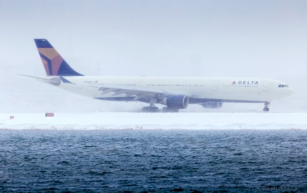 Delta jet from Amsterdam lands at Logan Airport