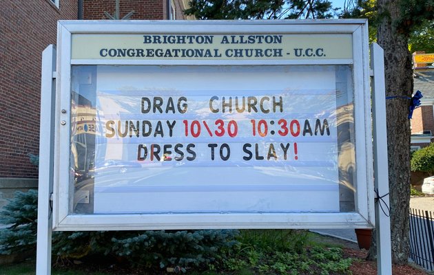 Sign advertising drag service at Brighton church
