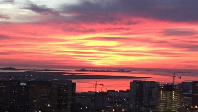 Sunrise over Boston Harbor and the South Boston waterfront