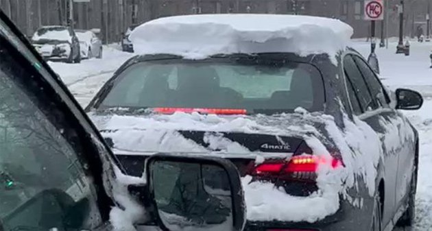 Mercedes covered in snow