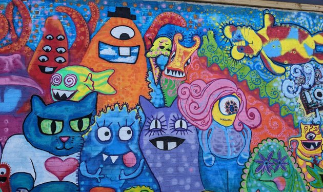 Monsters on a wall in Hyde Park