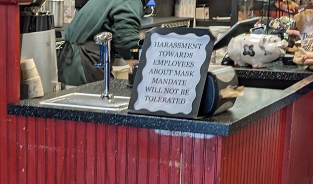 Sign at West Roxbury JP Licks: Don't harass employees over mask mandates