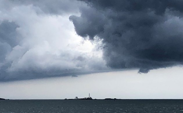 Ominous clouds over Boston Light