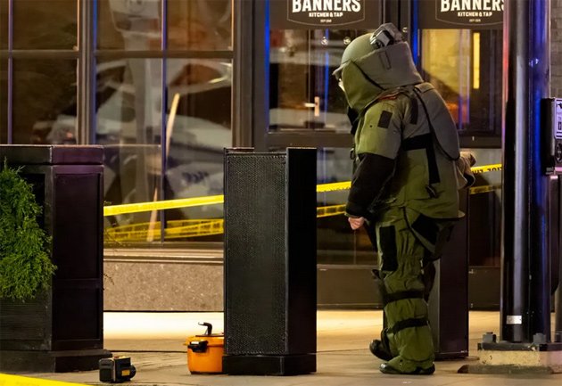 Bomb-squad member with pressure cooker