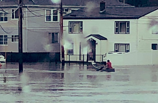 Man rowing a boat through Winthrop