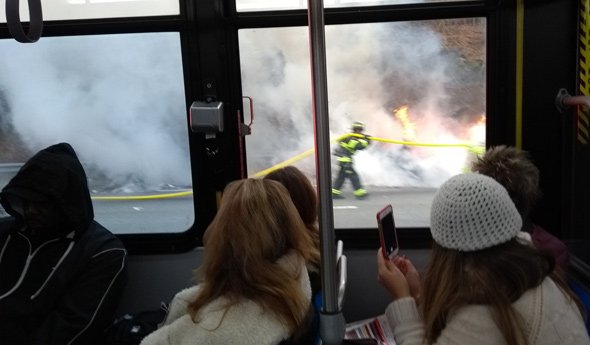 Watching trash burn from an MBTA bus