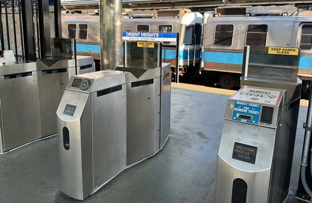Open fare gates at a Blue Line stop